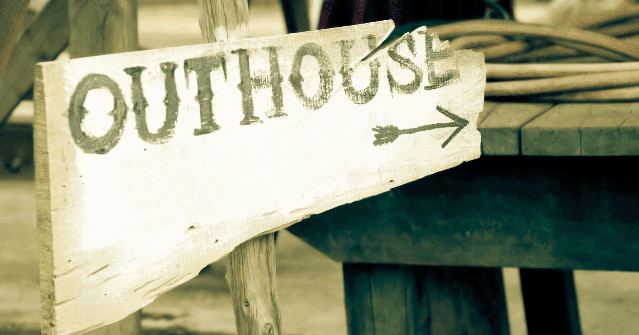 image of an outhouse sign