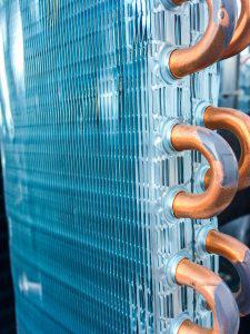 During an AC tuneup, the technician will clean AC unit coils