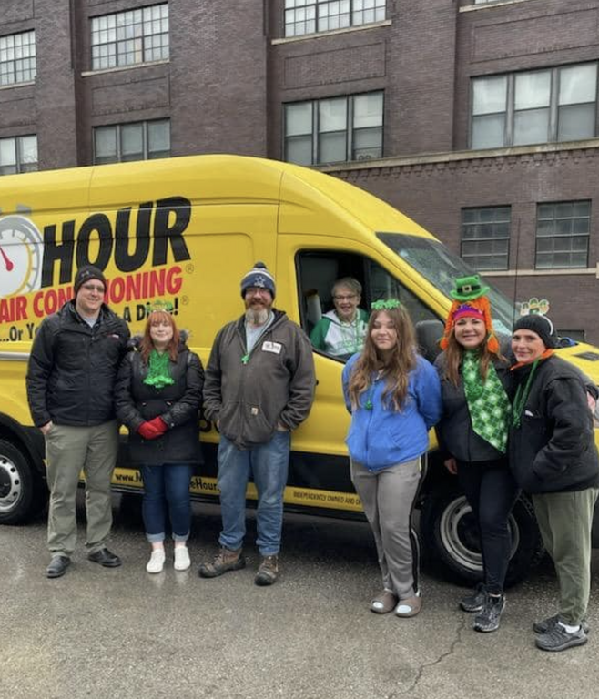 A picture of staff at a St. Patrick's day parade 