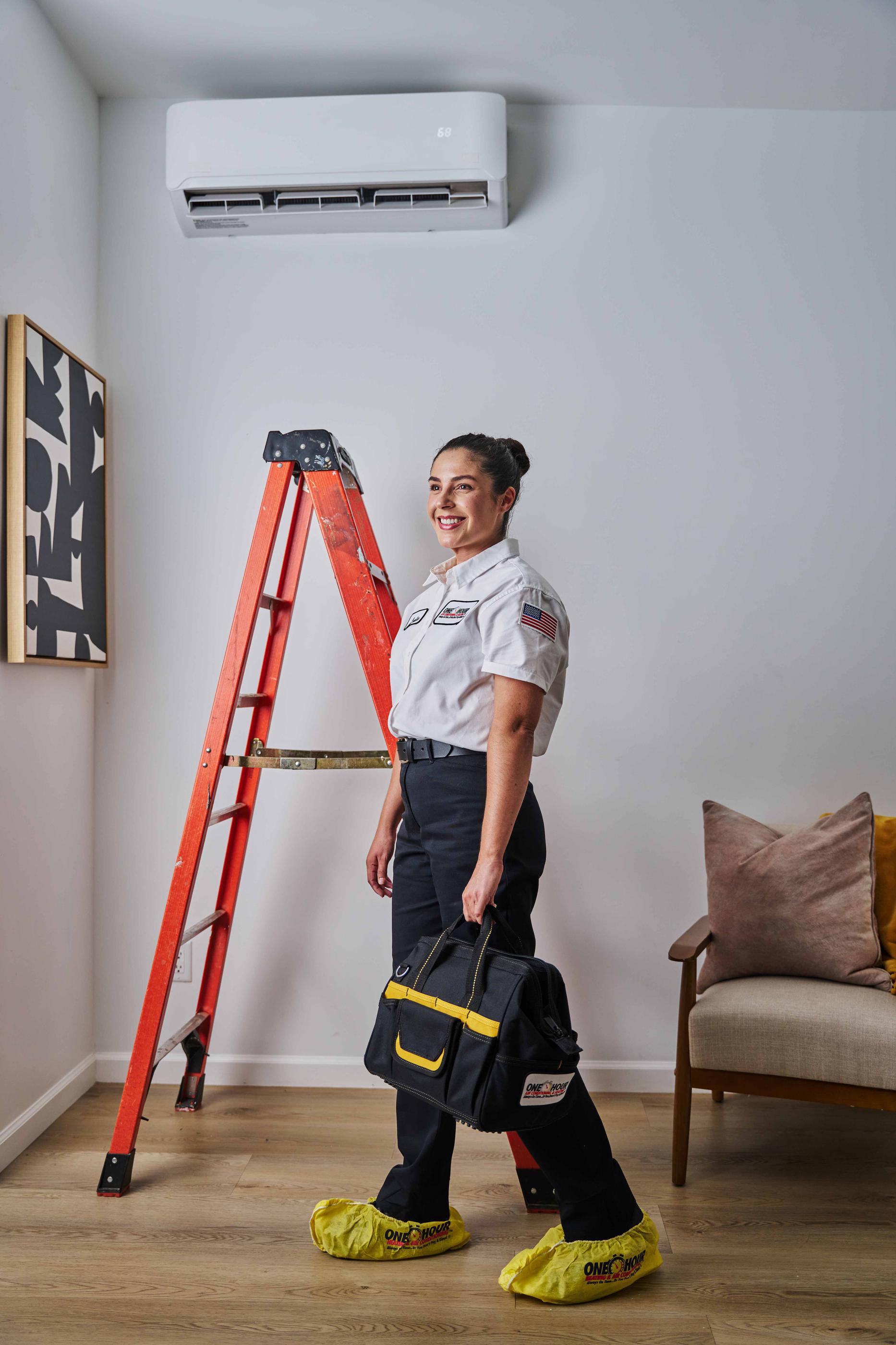 AC Repair Technician Wearing Shoe Covers in Kingman Home