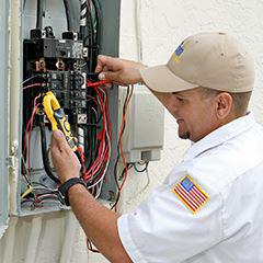 man fixing electrical wires