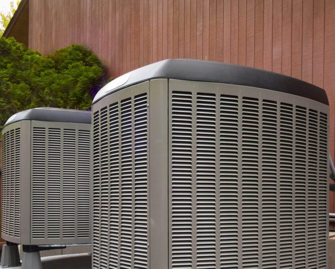 two AC units next to home