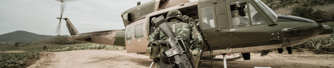 soldiers entering helicopter