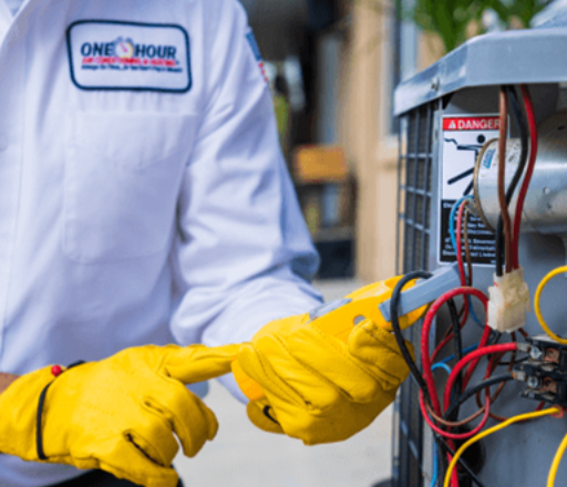 HVAC technician testing HVAC unit