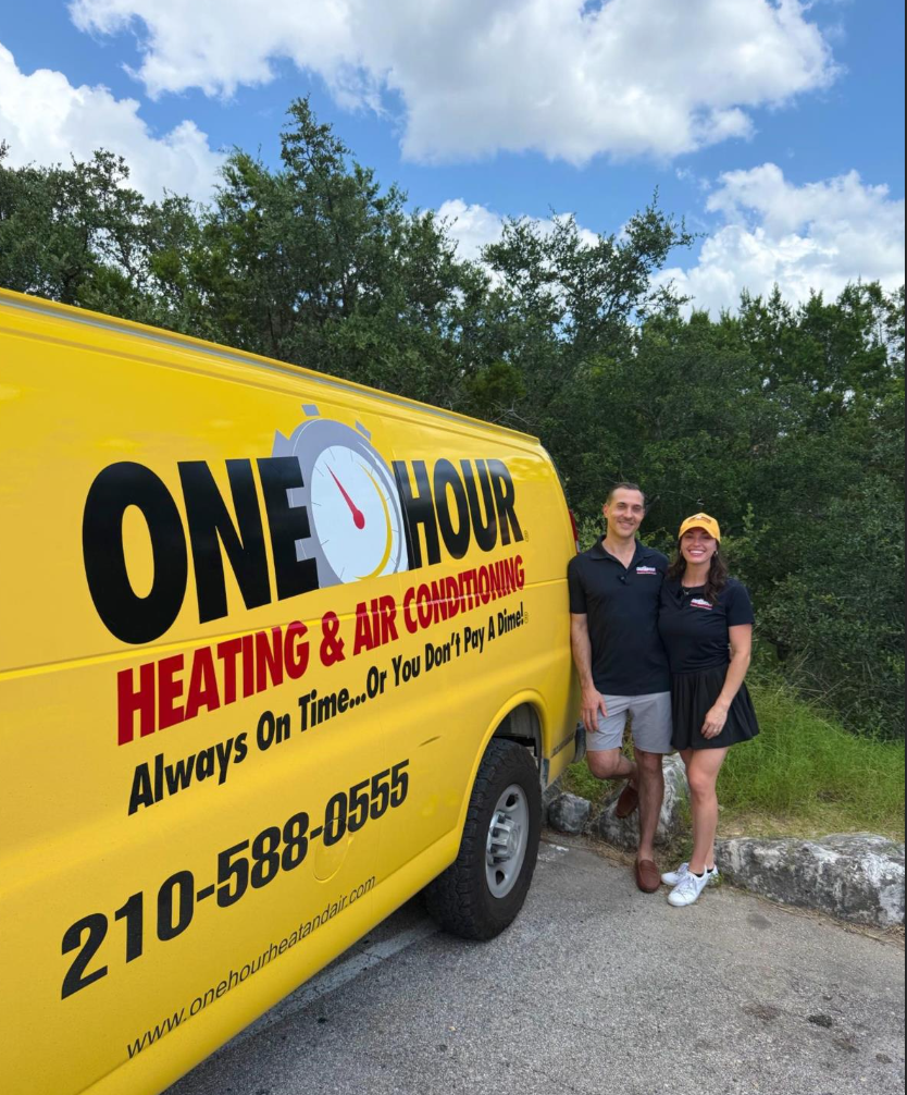 Family Smiling next to Yellow Van
