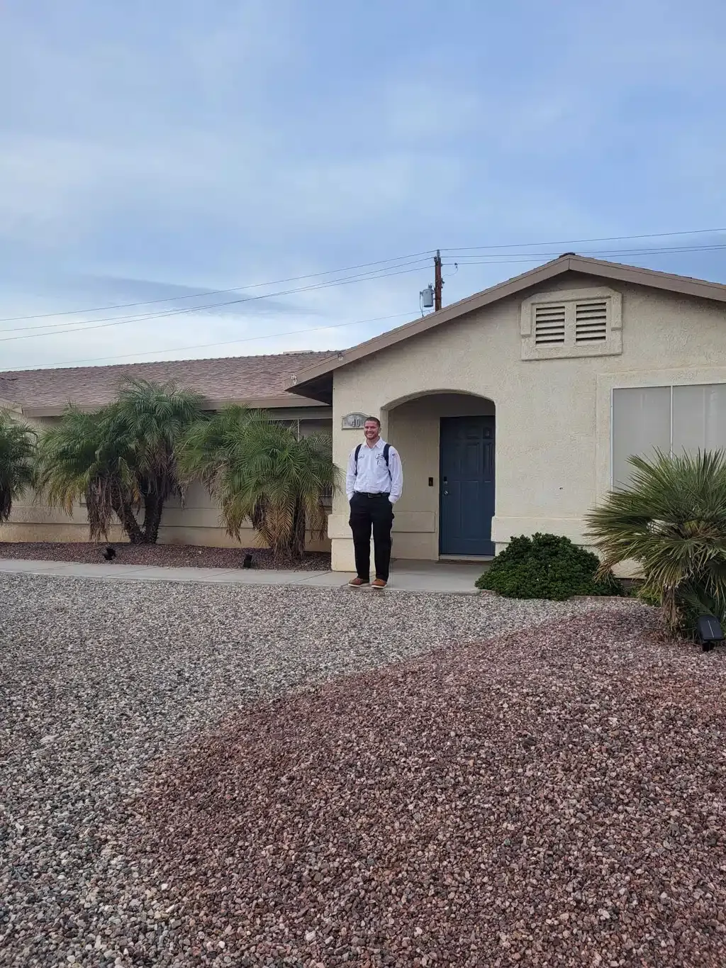 technician walking out of home